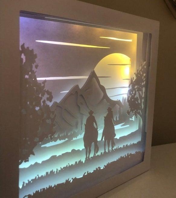 couple horse riding lightbox