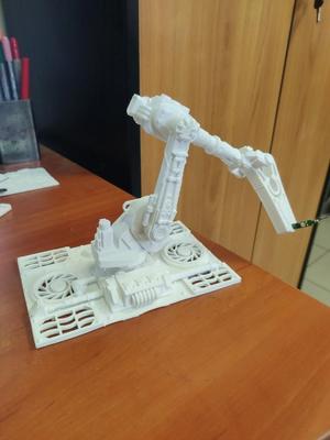 "Third Hand" styled as industrial robot