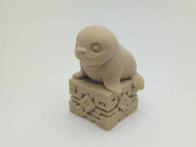 Playful Seal on Geometric Pedestal