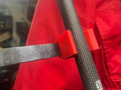 Fishing rod multiplier reel secure holding fixture
