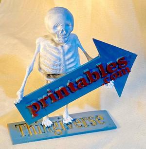 Skeleton Holding Sign