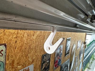 Hooks for the awning rail on the caravan