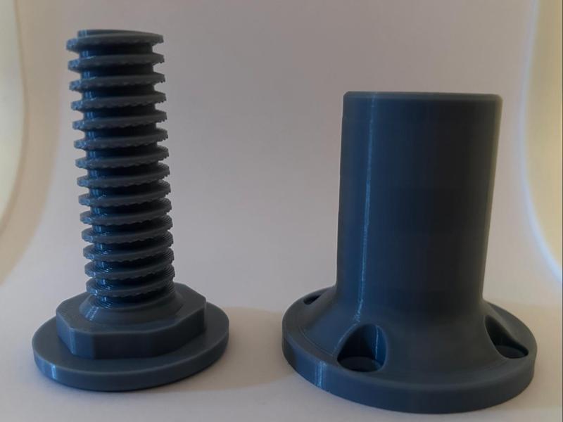 Furniture foot with holder for a panel or with a cover