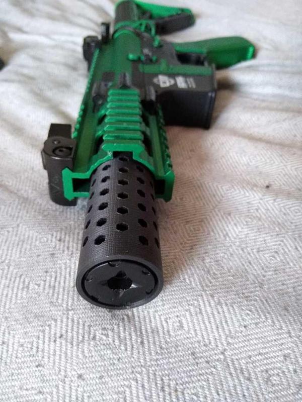 Tracer housing including barrel extension