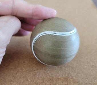 Tennis ball puzzle