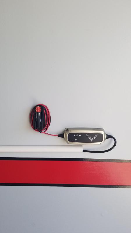 DC adapter wall hanger for battery tender