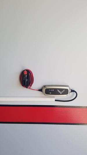 DC adapter wall hanger for battery tender