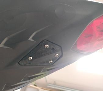 Triumph license plate holder cover