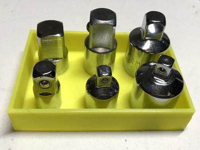 Socket adapter organiser