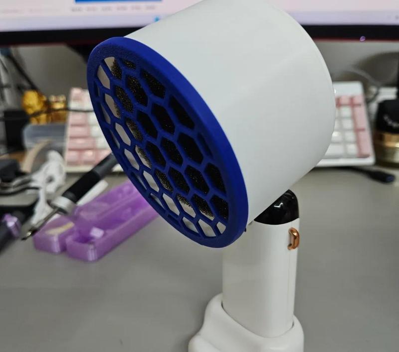 Handheld electric fan modified into a soldering iron smoke extractor