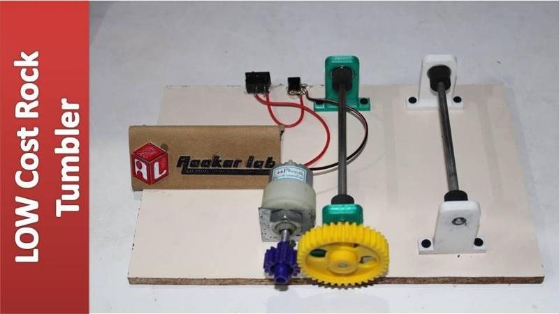 Low cost DIY Rotary tumbler using robotic parts and printer parts 