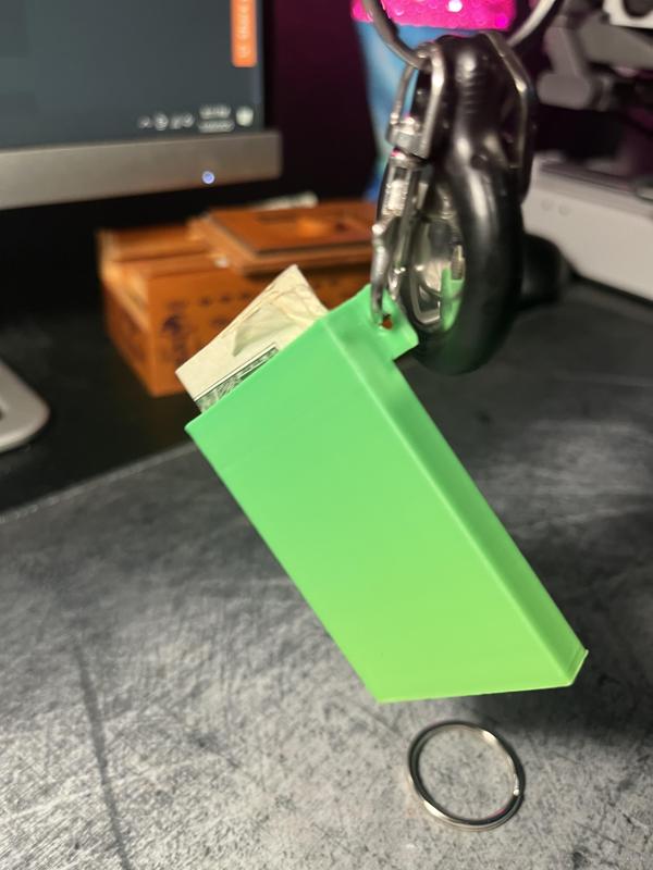 Small keychain wallet for extra cash