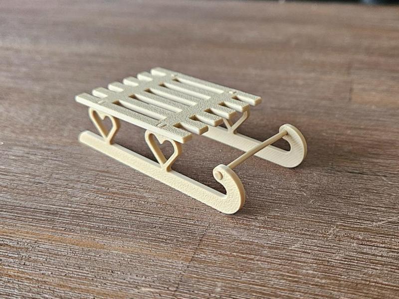 Sleigh (e.g., for decoration or as elf accessory)