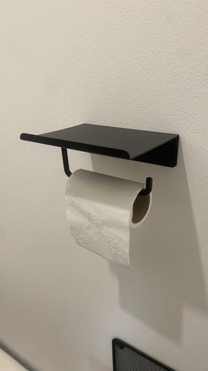 Toilet paper with phone holder