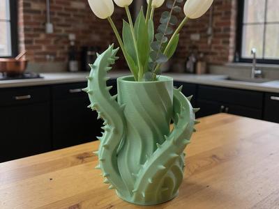 ThornVine vase with wild botanical twist