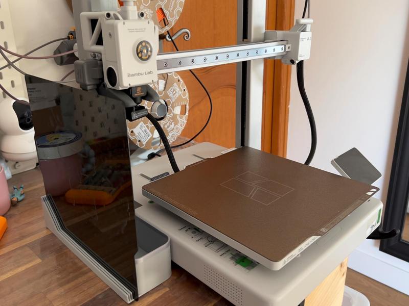 Waste tank and build plate holder