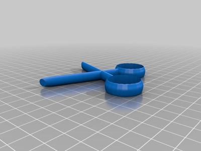 Scissor spinner