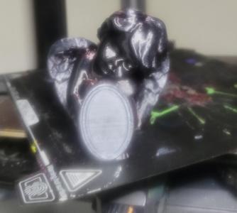 Sad angel with picture frame