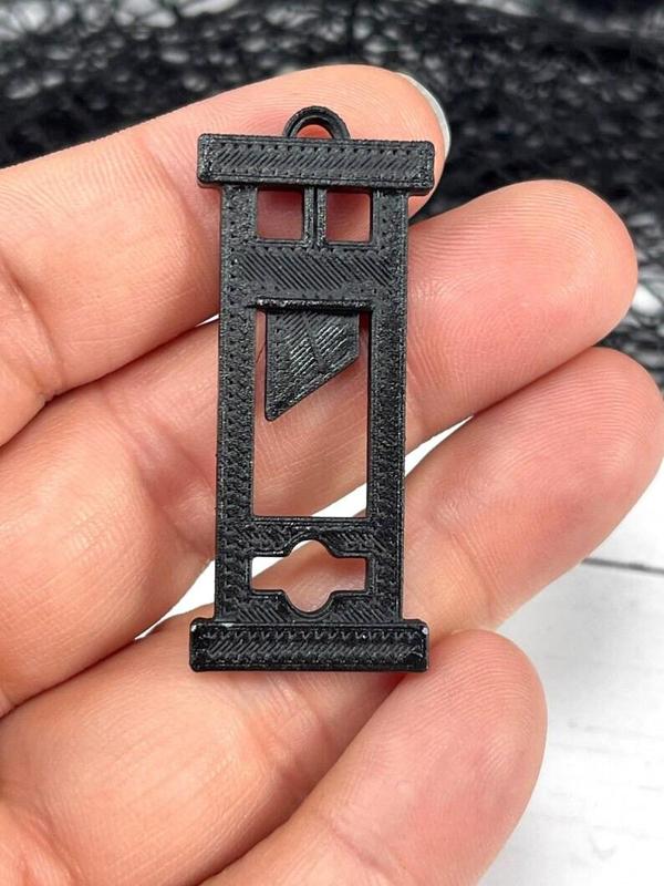 Guillotine Charm