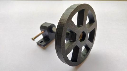 Idle wheel & holder and adjustable axle length