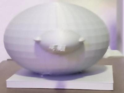 Cute unrealistic snake popping out of egg