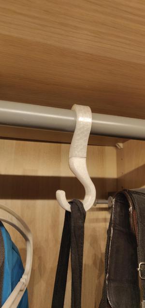 Print in place rotating hook for 25mm pipe hanger