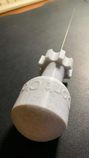 handle and dock for clog removal tool