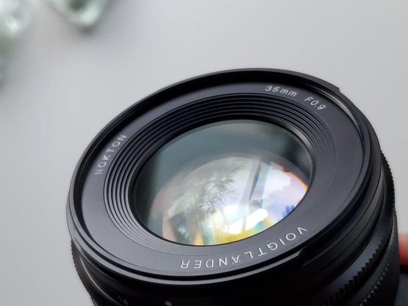 Voigtlander 35mm F0.9 Nokton lens built in 49mm filter adapter ring