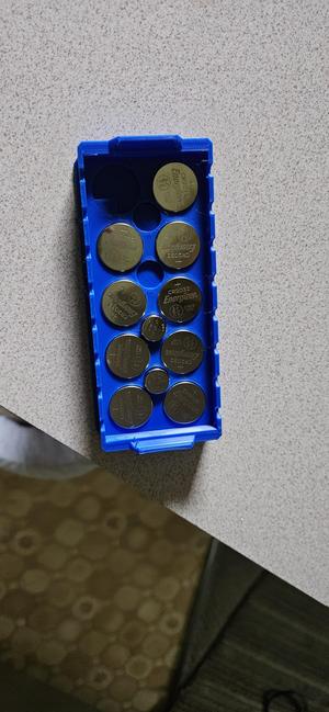 Stackable button cell battery holder