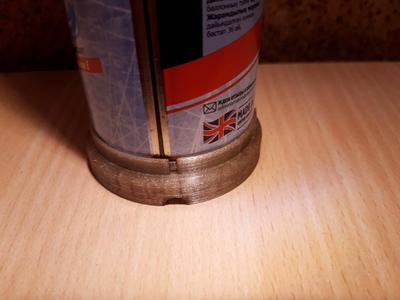 Stand for an aerosol can with shaving foam.
