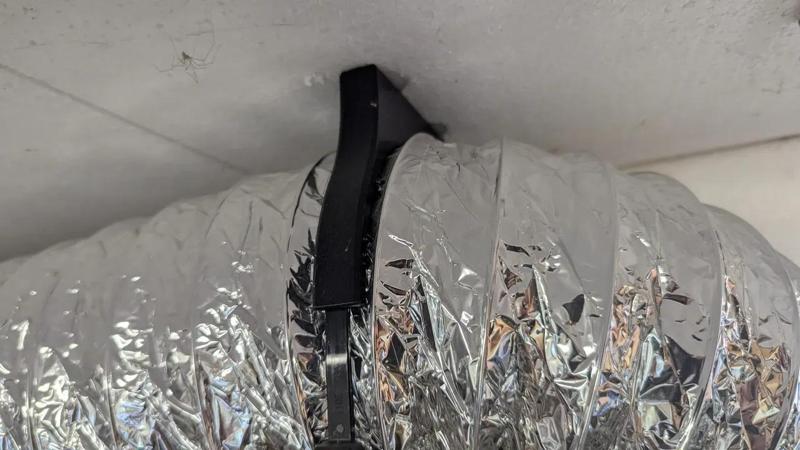 Exhaust Hose Clamp/Holder   