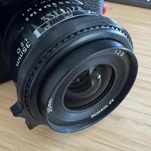 Focusing tab for Nikon 35mm AF lens   