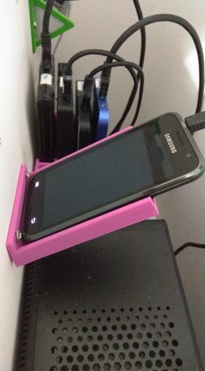 Inclined phone holder