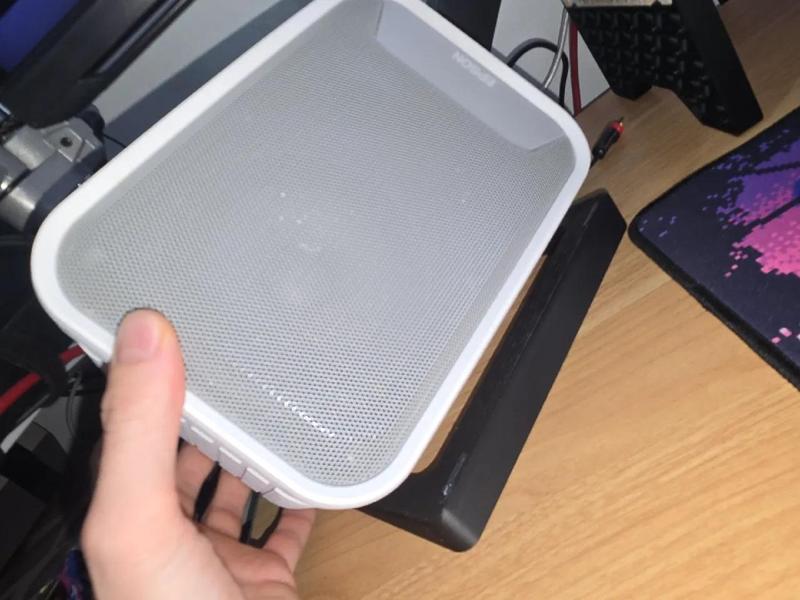 Speaker base/angle adjuster   