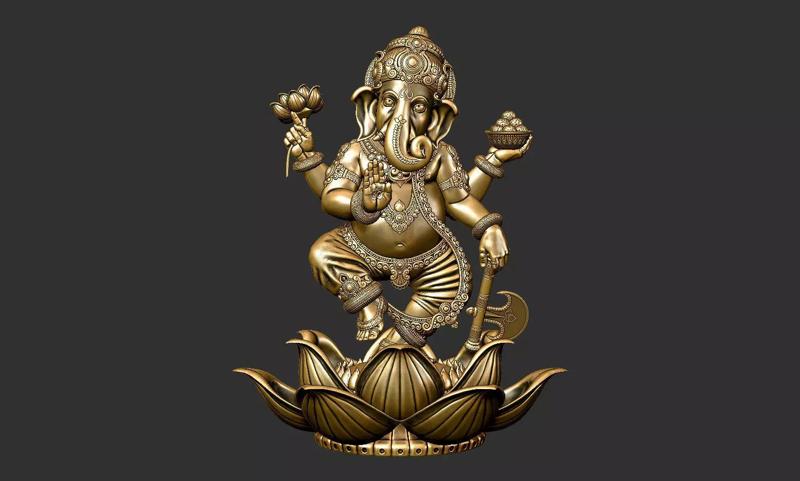 Ganesha golden statue of on lotus flower