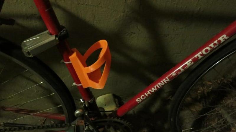 Water bottle cage for bicycles. 