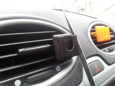 CB Radio mic dashboard holder.