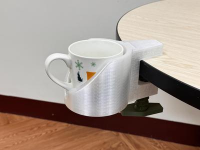 Deskside cup holder