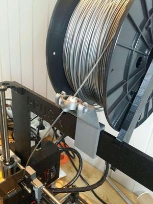 Gimballed filament guide with filament cleaner