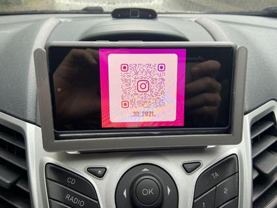 Car phone holder (CD player attachment)