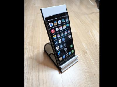 Holder for phones, readers, and small tablets.
