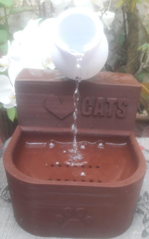 Drinking fountain running water for cats.