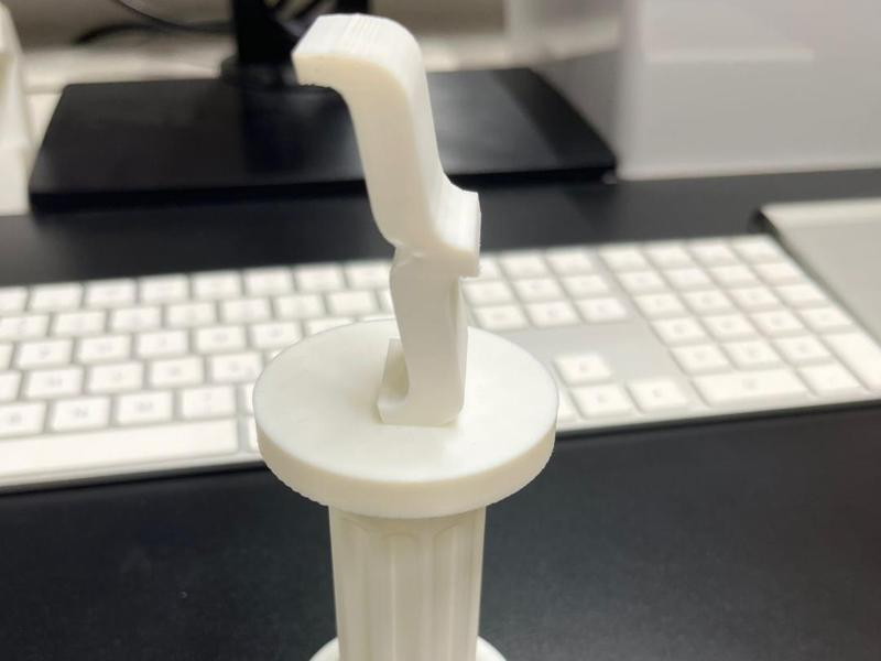 Programmer Symbol Statue on Base