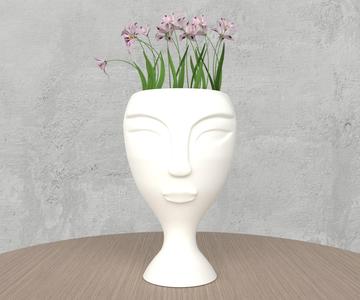 Buddha-face vase