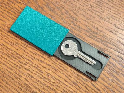 Secret box for a key   