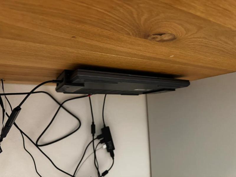 Laptop holder under a desk   