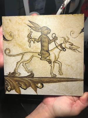 Hare riding a hound with a trained snail of prey. (Hueforge)   