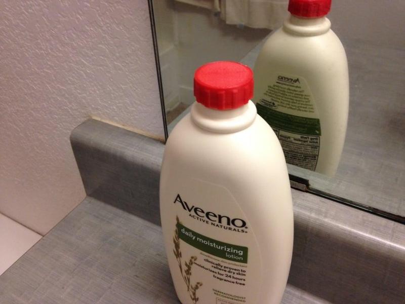 Threaded cap for Aveeno lotion bottle