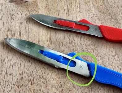 Scalpel handle (narrowed handle fitting to accomodate more blades)
