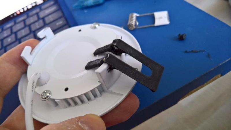 Recessed light spring